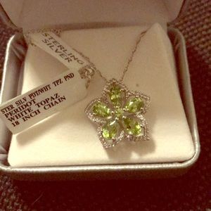 sterling silver peridot and white topaz pendent.